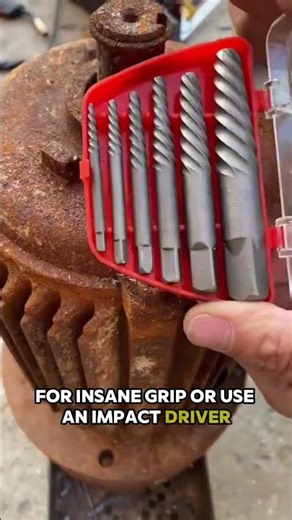 the process of removing a rusty screw