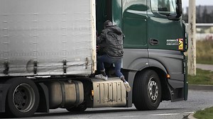 Watch: Migrants cling to UK-bound trucks in bid to cross Channel
