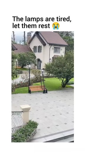 meme_machine.vibe on Instagram: "The post shares a 7-second video montage of street lamps playfully depicted as 'tired' and leaning on benches, trees, or walls in an outdoor urban setting, overlaid with the humorous caption "The lamps are tired, let them restemploys anthropomorphism—a common meme technique—to personify everyday objects for light-hearted entertainment, evoking smiles through visual puns. With zero engagement as of viewing, the content aligns with casual social media trends of sha