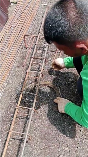 using wire to tie the column stirrups.