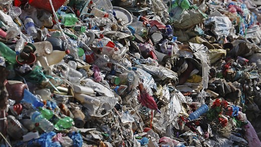 Everest's highest camp is littered with frozen garbage. The cleanup will take years