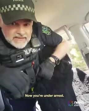 Wild moment cops smash in a 'sovereign citizen's' car