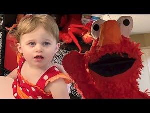 Destroying the creepy Elmo pinata at Ayla's 2nd birthday party!