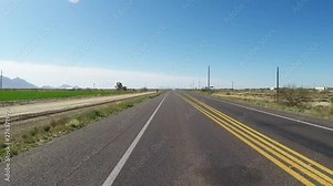 Driving Arizona Highway 87 Past Farm Fields