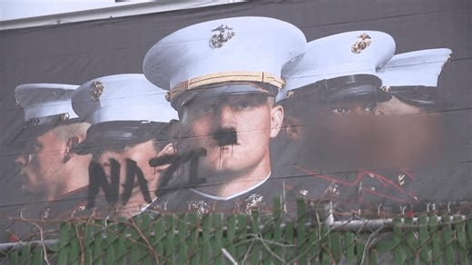 Graffiti on US Marine Corps billboard sparks outrage in Baltimore