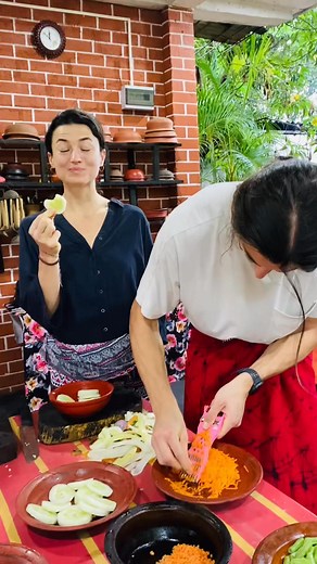 see Their happy faces 🥰🇱🇰👩‍🍳 Today we had the sweetest couple from France join our Eco Kitchen cooking class here in Sigiriya. 🇫🇷❤️🇱🇰 They arrived with big smiles, curious hearts, and a love for discovering Sri Lankan flavours. From grinding fresh coconut by hand to cooking traditional village-style curries, they enjoyed every moment like true food lovers. We shared stories, laughed together, and learned how food can connect people from different parts of the world. Experiences like the