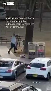 Watch the moment a hero tackles one of the Bondi beach gunmen