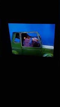 Sesame Street Two Headed Monster Driving A Car