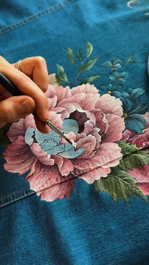 First denim jacket I’ve painted for a while and this design was so much fun! Pastels and blue denim are just 😚🤌🏻 . . #painting #denim #denimjacket #wearableart #wedding #bridejacket #painteddenimjacket #painteddenim #upcycledfashion #vintage #customclothing #personalised #jacket | Painted Love Customs