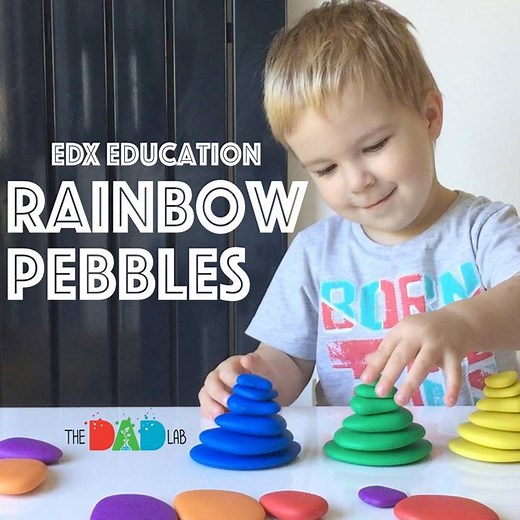 Rainbow Pebbles is early mathematics manipulative from Edx Education. 36 plastic pebbles are designed in 6 colours and 6 sizes and they have a really nice feel to them. Age restriction is 3 , but Max was really into the set. With him, we practised sorting by colour and size and sequencing. And he just loved balancing pieces to build towers. Alex was more into copying designs from supplied activity cards or just making his own creatures. Get yours here http://geni.us/pebbles | TheDadLab