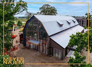 Take a look inside The Beck Barn in West Lafayette as construction continues on this one-of-a-kind project. The reclaimed barn wood is being carefully integrated around a new steel structure—blending history with modern craftsmanship. Beck Barn, donated by Sonny Beck, CEO of Beck’s Superior Hybrids, and the Beck family, stood for over 100 years in Sheridan, Indiana, before it was carefully dismantled and prepped for reuse. Now, that same wood is being brought back to life on the edge of Purdue U