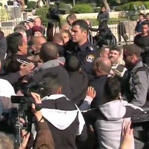 Hundreds of Palestinians protested in a "day of rage" Friday in the occupied West Bank, Gaza and in East Jerusalem against U.S. President Donald Trump's recognition of the ancient city as Israel's capital. As Friday prayers ended at the Al Aqsa mosque in Jerusalem, worshippers made their way toward the walled Old City gates, chanting "Jerusalem is ours, Jerusalem is our capital," and "We don't need empty words, we need stones and Kalashnikovs". Some scuffles broke out between protesters and poli