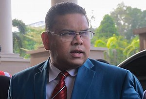 Lokman Adam arrested during a Facebook Live session