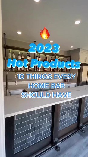2.8K views · 15 reactions | 2023 Top Home Bar Must Have Options! If you’re planning a Bar in your House, Check Out the Top 10 Must Have Options to Consider. This Bar has Everything from Custom Cabinetry to a LED Lit Bourbon Display Wall. But don’t overlook the Massive TV and Linear Fireplace. Plus no tracking down the basement because this one’s right on the first floor with a Incredible view of the pool. #design #bar #homebar #reels #viral | Interior Trend Inc. | Facebook