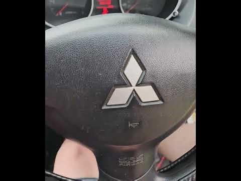 How to find the camshaft position sensor on a Mitsubishi outlander