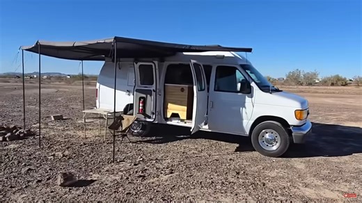 This Budget-Friendly Ford E-350 Camper Van Stands Out With a Clean, No-Frills Living Space