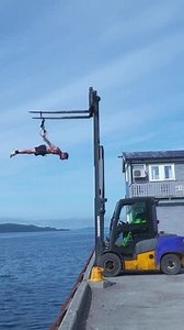 1.4K views | This man decided to take gymnastics to a whole other level, and used a forklift facing towards the water to suspend himself over a dock. The forklift lifted him to a certain height, where he did an impressive front lever. | Jukin Copyright Management | Facebook