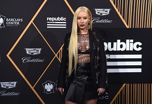 Iggy Azalea Flaunts Her Tiny Waist & Sun-Kissed Skin In New Snap