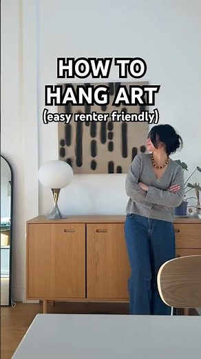 An easy way to hang canvas art that is renter friendly and easy to remove ​- this ‪@command‬ is my fav