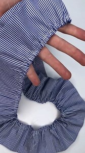 How to Make a ruffle 1) Stitch a straight line using the longest stitch length on your sewing machine. Do not backstitch. 2) Gently pull the bottom bobbin thread to gather fabric and create a ruffle. Check out the Repurpose Faves into Keepsake Sewing Tutorial: https://bit.ly/4r1paOu | Coats & Clark