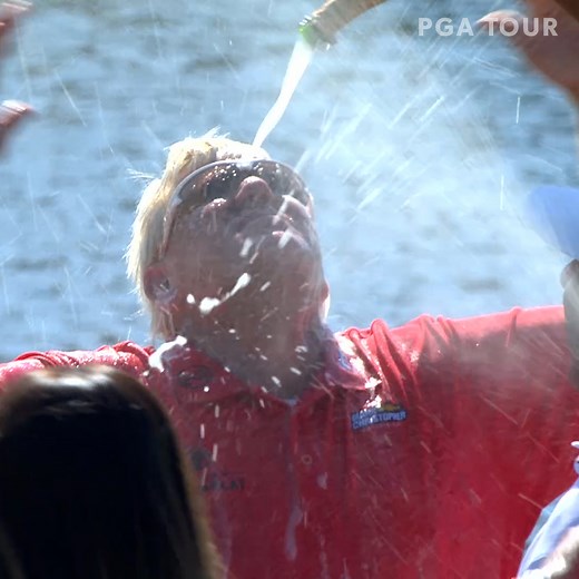John Daly got doused with champagne on 18 after capturing the 2017 Insperity Invitational. | PGA TOUR Champions