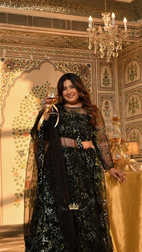 𝗘𝗺𝗲𝗿𝗮𝗹𝗱 𝗔𝗰𝗰𝗲𝗻𝘁𝘀. 𝗕𝗹𝗮𝗰𝗸 𝗘𝗹𝗲𝗴𝗮𝗻𝗰𝗲. 𝗢𝗻𝗲 𝗦𝗵𝗼𝘄-𝗦𝘁𝗼𝗽𝗽𝗶𝗻𝗴 𝗟𝗲𝗵𝗲𝗻𝗴𝗮.✨ . 𝗣𝗿𝗲𝘀𝗲𝗻𝘁𝗶𝗻𝗴: Midori - Black & Green Sequin Embellished Net Lehenga Set🌟 . 𝗙𝗲𝗮𝘁𝘂𝗿𝗲𝘀: 🎀Sheer net detailing on the front and sleeves 🎀Adorned with green sequin embroidery that creates a captivating 🎀Paired with a Kalidhar lehenga richly embellished with green sequin 🎀A drawstring closure finished with handcrafted tassels 🎀A sheer net dupatta featuring matching sequi