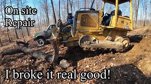 On site field repair of John Deere 650H dozer track that came off, but why did it fall off? Operator?