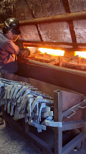 BRING THE HEAT! Freedom bars incubating. Multiple process come together to create the Chicago Adz. This includes forging each side of the bar separately. After upset, the Adz side of the tool is forged, trimmed and formed. Equipment is the setup for the fork side and blanks go back into the furnace. Forging, trimming, alignment and straightening all follow to complete the forging process. Machine and grind finish, heat treat, and black oxide round out the final steps of producing a truly street 