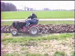 518H Wheel Horse Plowing Garden