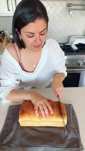 8 Hour Sourdough 125g starter 325g water 500g AP Flour 12g EVOO 12g honey 12g salt - Combine then kneed for 3-4 minutes, scrape down sides and rest 30 mins - 4 sets of stretch and folds: once every 30 minutes - Let rise for 3-4 hours - Laminate (flatten) then stretch (fold over then roll up). - Set in greased pan to proof for 2-3 hours. - Bake at 375° for 35 minutes, uncovered. - Butter top once out. - Cool 2 hours before taking out and cutting. #homemade #homemadebread #homemadesourdough #sourd