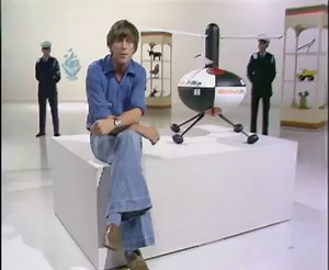 #OnThisDay 1976: Security guards kept a watchful eye on John Noakes, as he droned on about a new top-secret remote-controlled helicopter. | BBC Archive