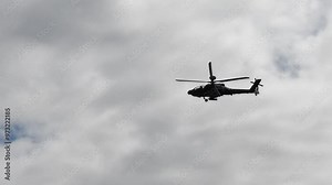 British army Boeing Apache Attack helicopter AH64E (AH-64E ArmyAir606) AH2 performing low level flight manoeuvres