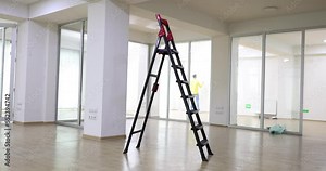 Construction ladder standing in room for repair 4k movie slow motion