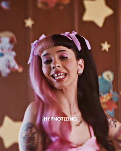 Hypnotizing Dance with Pink and Black Hair