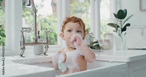happy baby bathing funny toddler taking bath in kitchen sink having fun with soap bubbles 4k