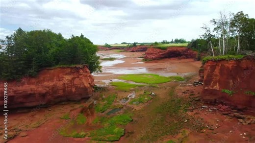 low tide around big rock at Bay of Fundy shore line