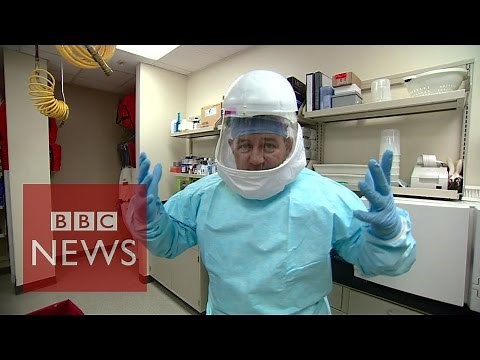 Ebola: How doctors protect themselves from the virus - BBC News