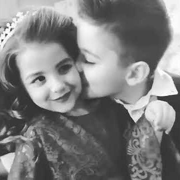 Little boy kiss with little Baby Girl