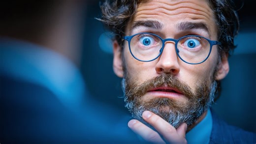 Astonished Expression: Capturing the Moment of Shock and Surprise in a Professional Setting with a Focus on Facial Features and Emotions | Premium Stock Video Footage