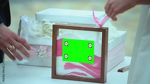 Sand ceremony at the wedding, the bride and groom pour sand layers, wedding tradition, wedding show, mixture of colored sand.