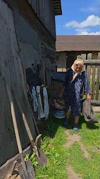 Life in the village. Old Granny goes about her daily chores #village #villagerlifestyle