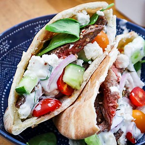 10K views · 31 reactions | These pitas are stuffed with juicy Greek marinated bison flank steak, fresh veggies, feta cheese and then drizzled with an easy homemade tzatziki sauce. Ready in just minutes, this bison flank steak is broiled to perfection. RECIPE: https://greatrangebison.com/greek-bison-pitas/ | The Starving Chef | Facebook