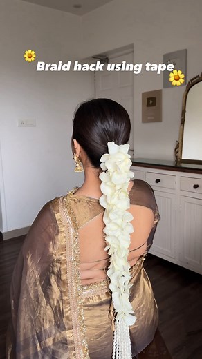 Flower braid with 0 pins ✨ . Comment down for links 🔗 Used @dotandkey.skincare barrier repair ceramide moisturiser 💙 . . #reelsinstagram #reels #itistanyasingh #hair #haircare #hairstyle #braidhack #hack | Tanya Singh