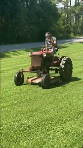 1949 farmall cub mowing here inTN