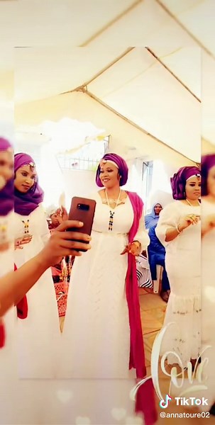 Celebrating Traditions: Women in White Attire Gathering
