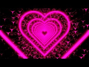 Pink neon heart with particle shaped lights on black background. 4K Video Loop