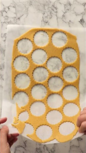 Soft Raspberry Linzer Cookies with a Jammy Center