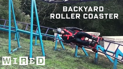 Guy built backyard roller coaster.