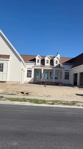The garages on this home are set at opposing angles — one facing the street, the other tucked along the side. It’s a layout that breaks up the front elevation and keeps the main entry feeling clean and centered. Some people love it for the symmetry and separation. Others prefer a single, sweeping garage line that feels more unified. I’m curious what you think — do you like this configuration or would you change it? #AlpineManor #HomeDesign #Architecture #GarageDesign #Builder #LuxuryHomes #UtahH