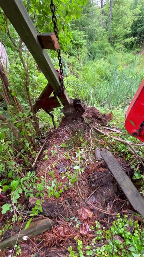 Red Kubota Excavator Undermining Submerged Concrete Footing in Active Natural Stream Bed #farming